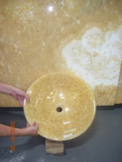 Here is the pre-made onyx sink, and I am trying to match it to a slab of onyx at the stone yard.